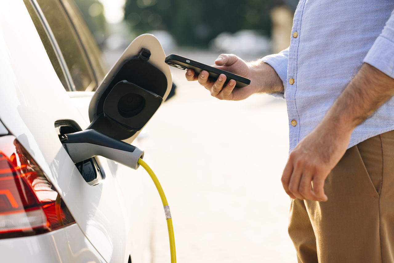 Man charging his car